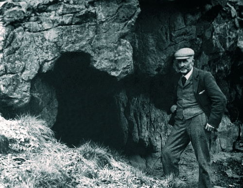 Benjamin Harrison outside Oldbury Rock Shelter (Kent Archaeological Society)